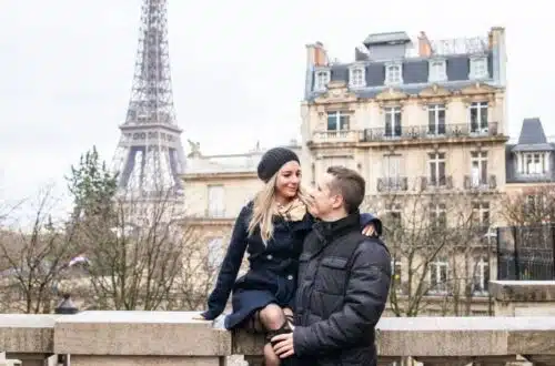 couple in paris before eiffel tower