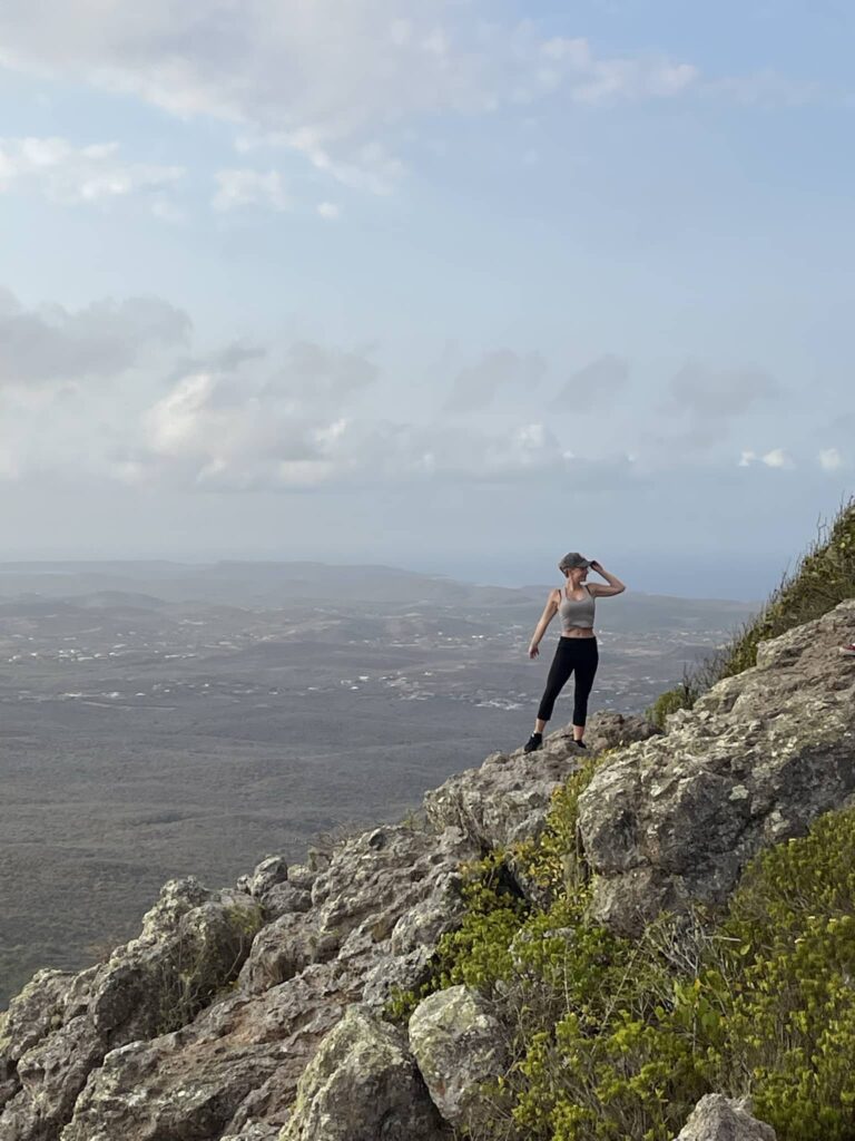 Christoffel Berg Curacao with blonde girl in hiking outfit