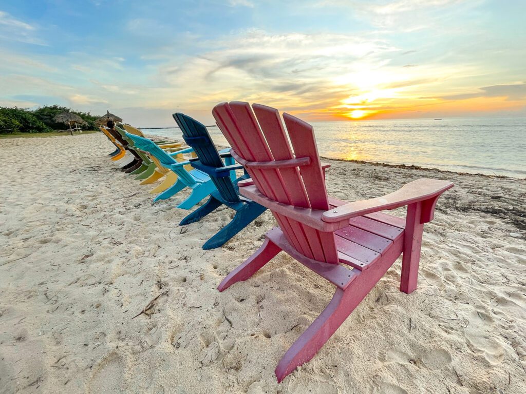Colorful chairs before sunset - Divi Phoenix Resort Aruba most instagrammable spot