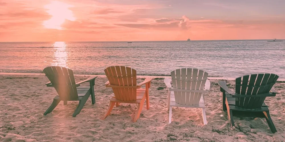 aruba chairs colorful at sunset