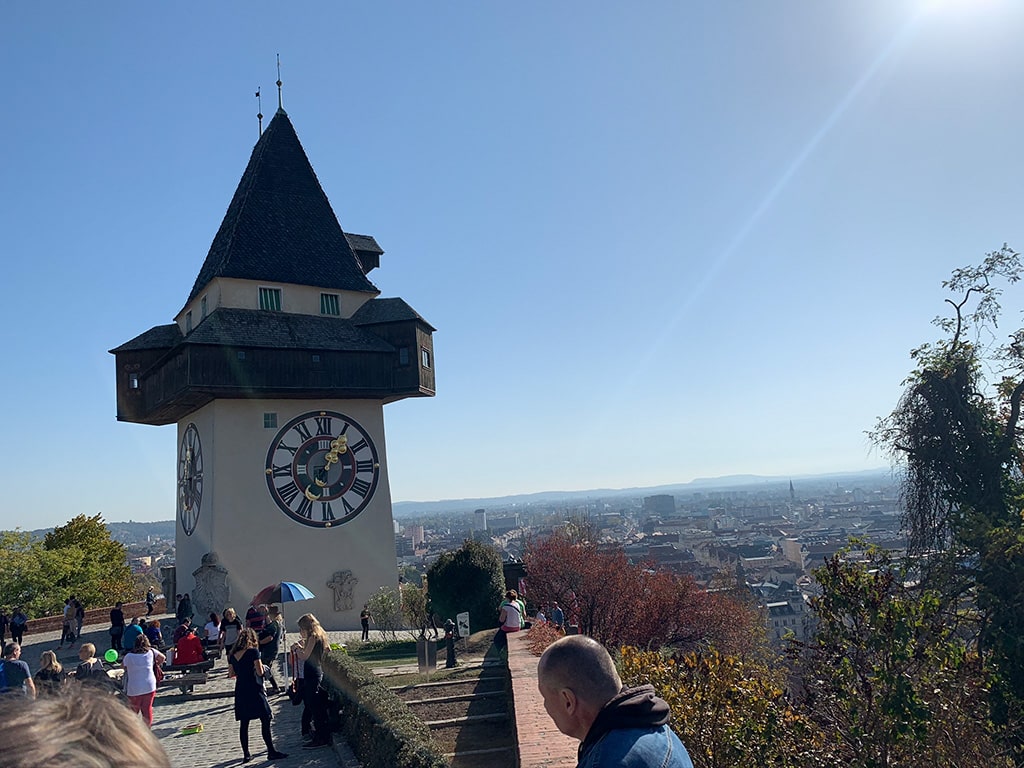 The famous Graz clock tower with view of the city behind it