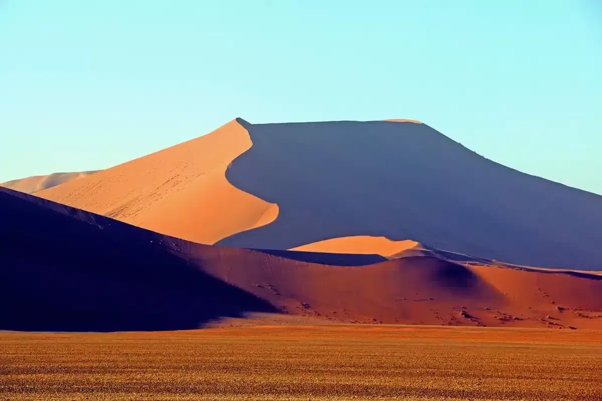 spectacular red sand dunes of Sossusvlei in Namibia  adventure bucket list lifetime destinations