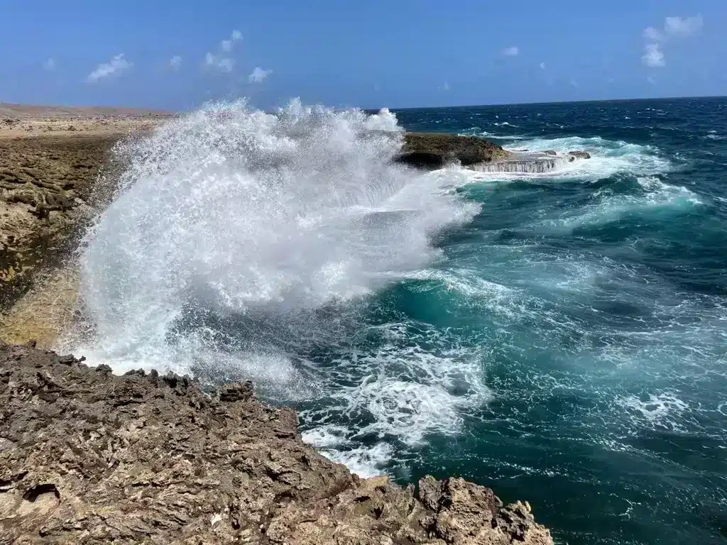 Amazing big waves crashing on shore in Shete Boka national park in Curacao