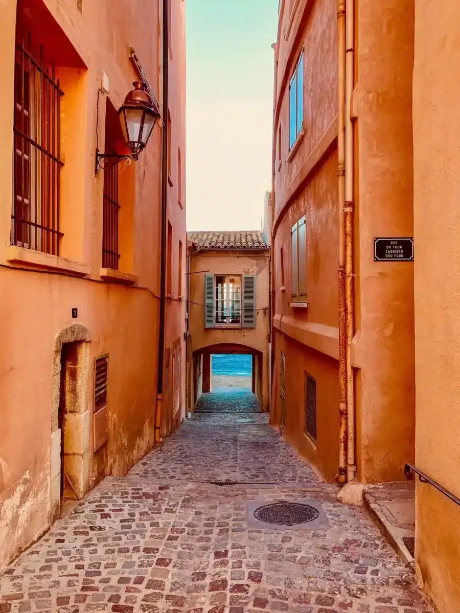 Small alley of orange houses in Provence