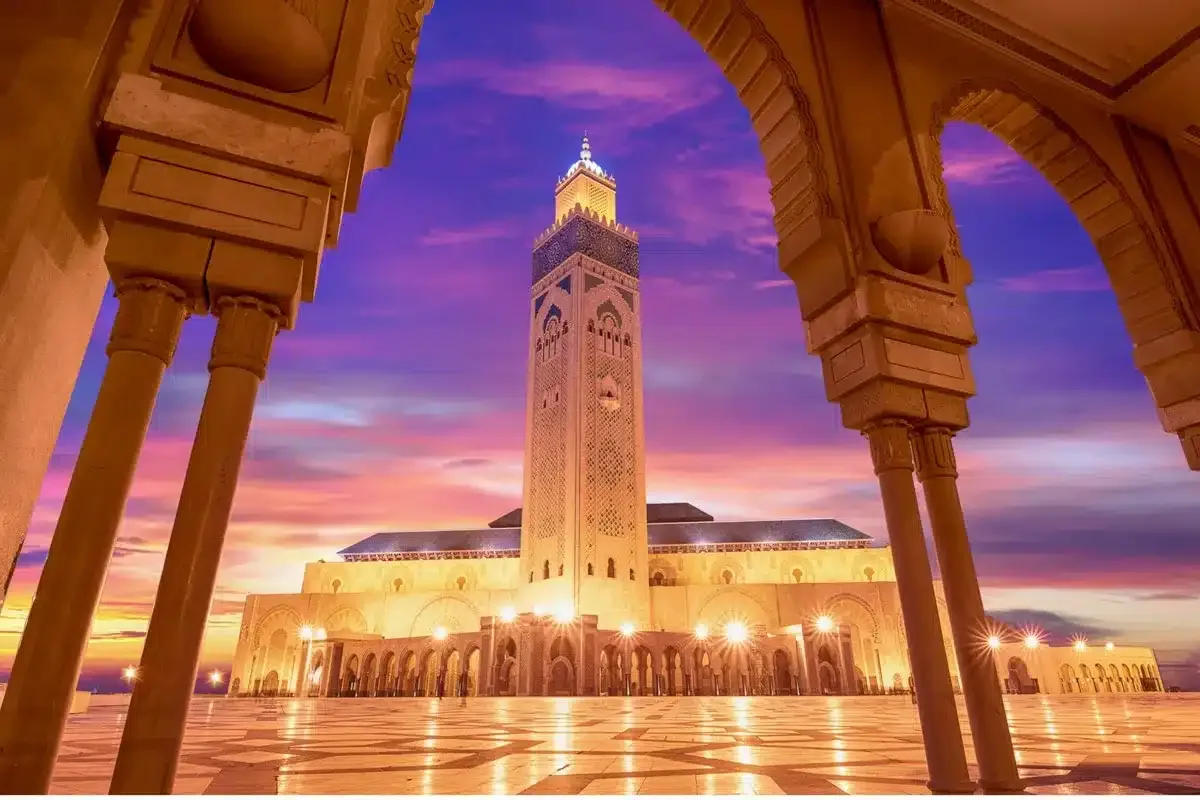 Picture of Mosque in Casablanca at sunset with stunning pink and purple colors