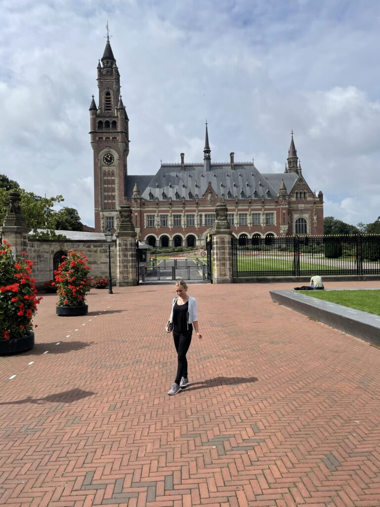 the author in front of the peace palace in the hague