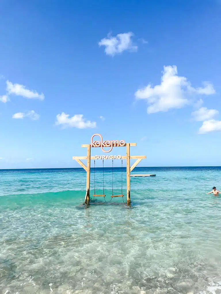famous kokomo swings on kokomo beach in the water 