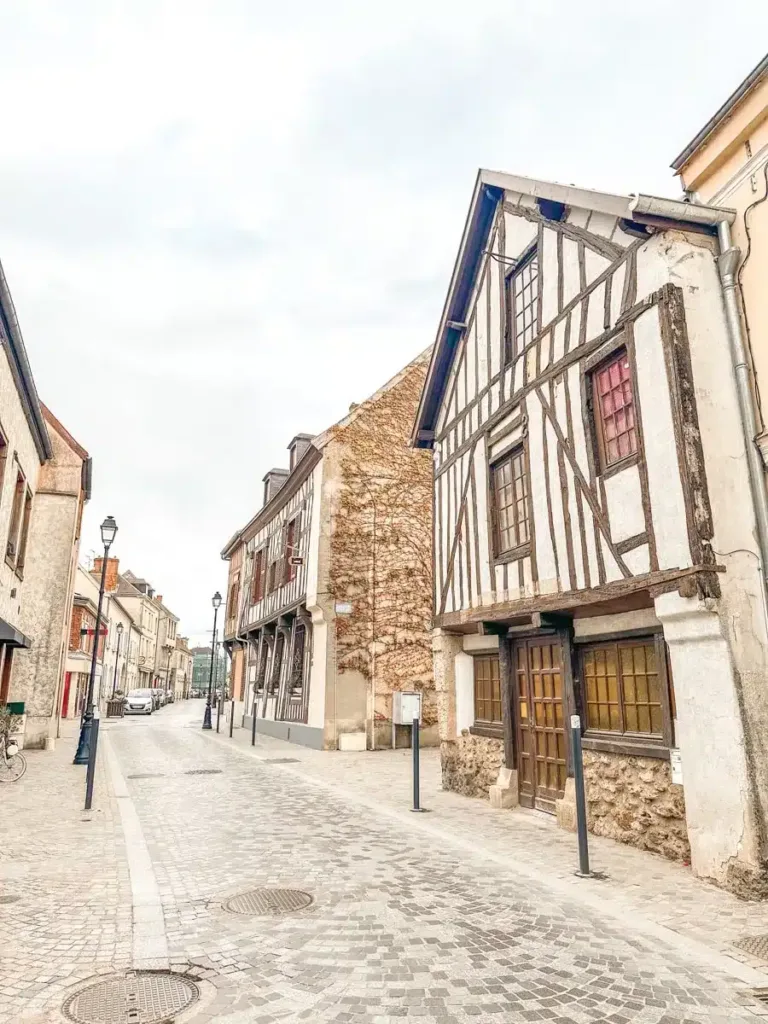 picture of cute village called ay de champagne with half timbered houses 