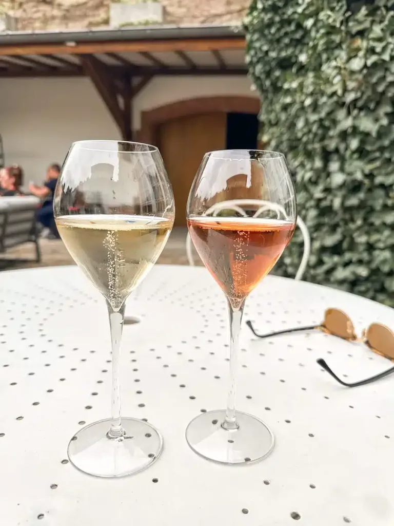 two glasses of bubbly champagne with sunglasses in epernay
