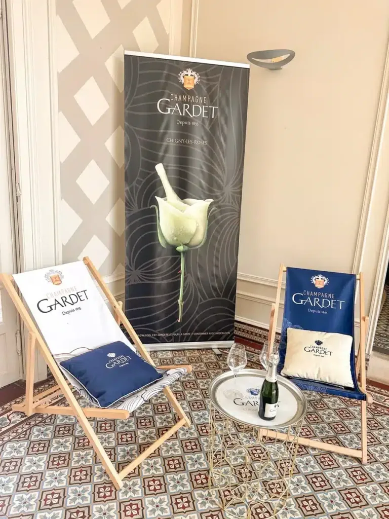 two relaxing chairs and banner of champagne gardet in chigny les roses