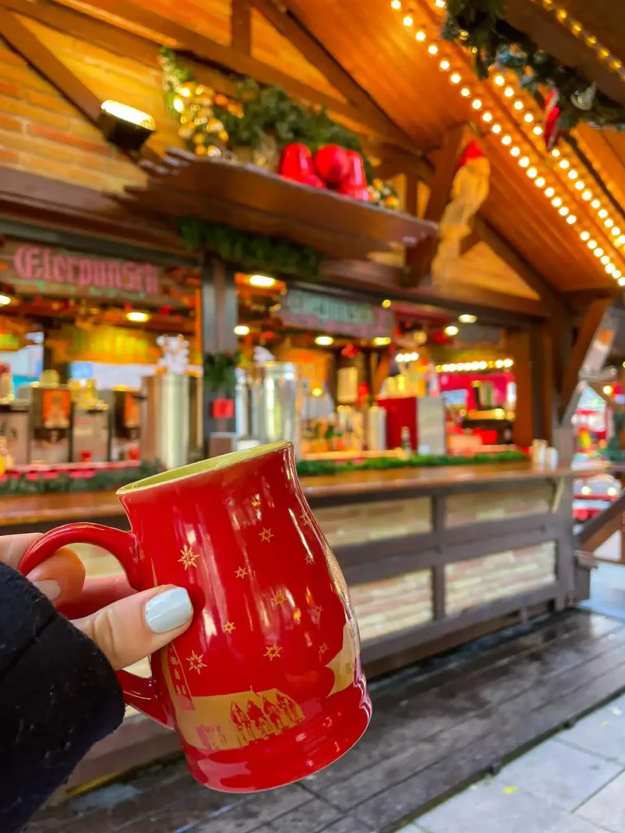 mug filled with hot mulled wine on a christmas market in austria