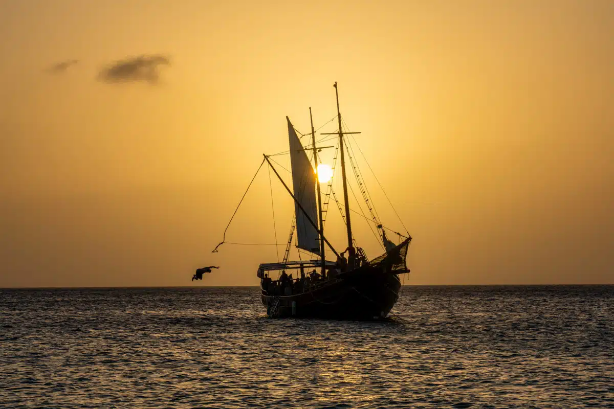 jolly pirate ship at sunset in aruba