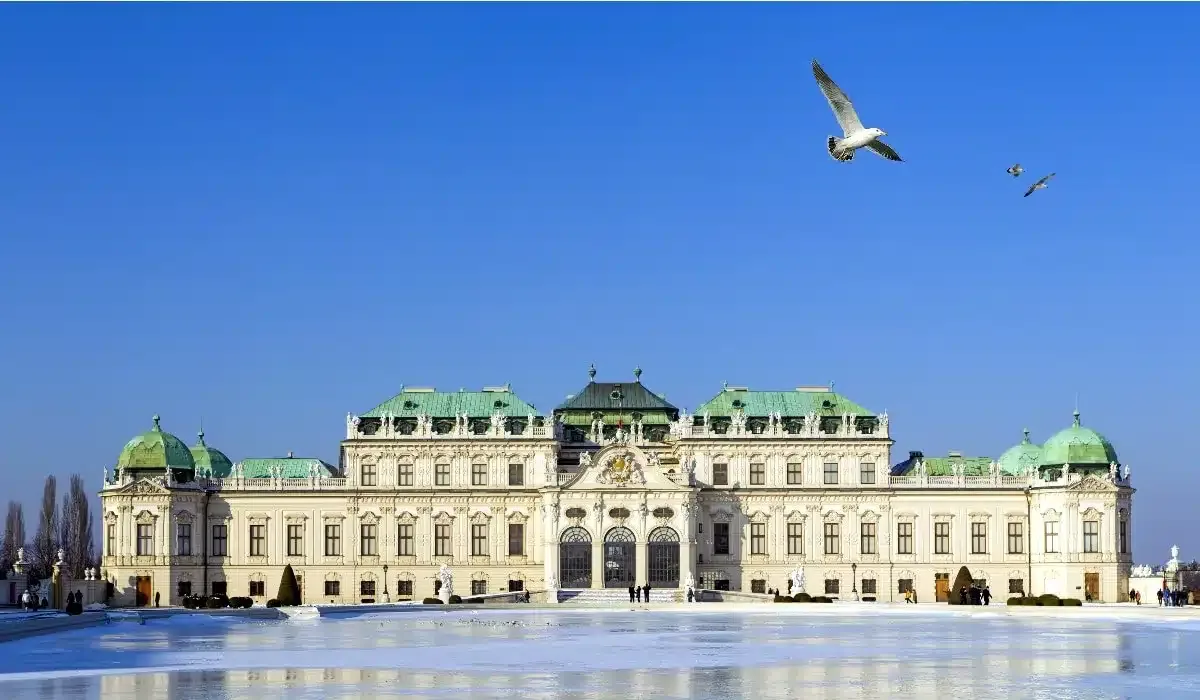 Belvedere Palace in Vienna with snow and frozen fountain in front 