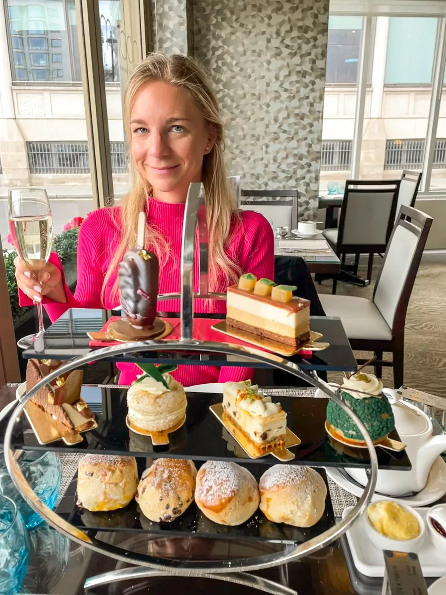 the author drinking traditional high tea in london 