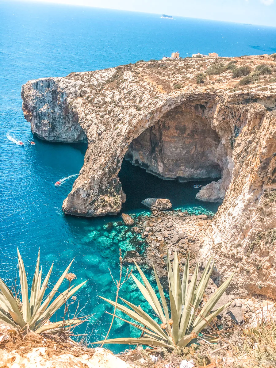 stunning shot of the blue grotto in malta 