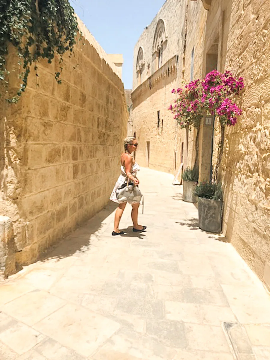the author posing in mdina in malta