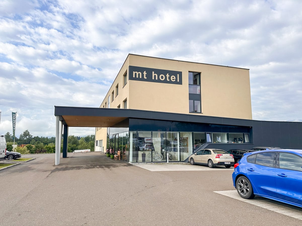 picture of the mt hotel in zeltweg bei spielberg from the outside with cars in front hotel near red bull ring