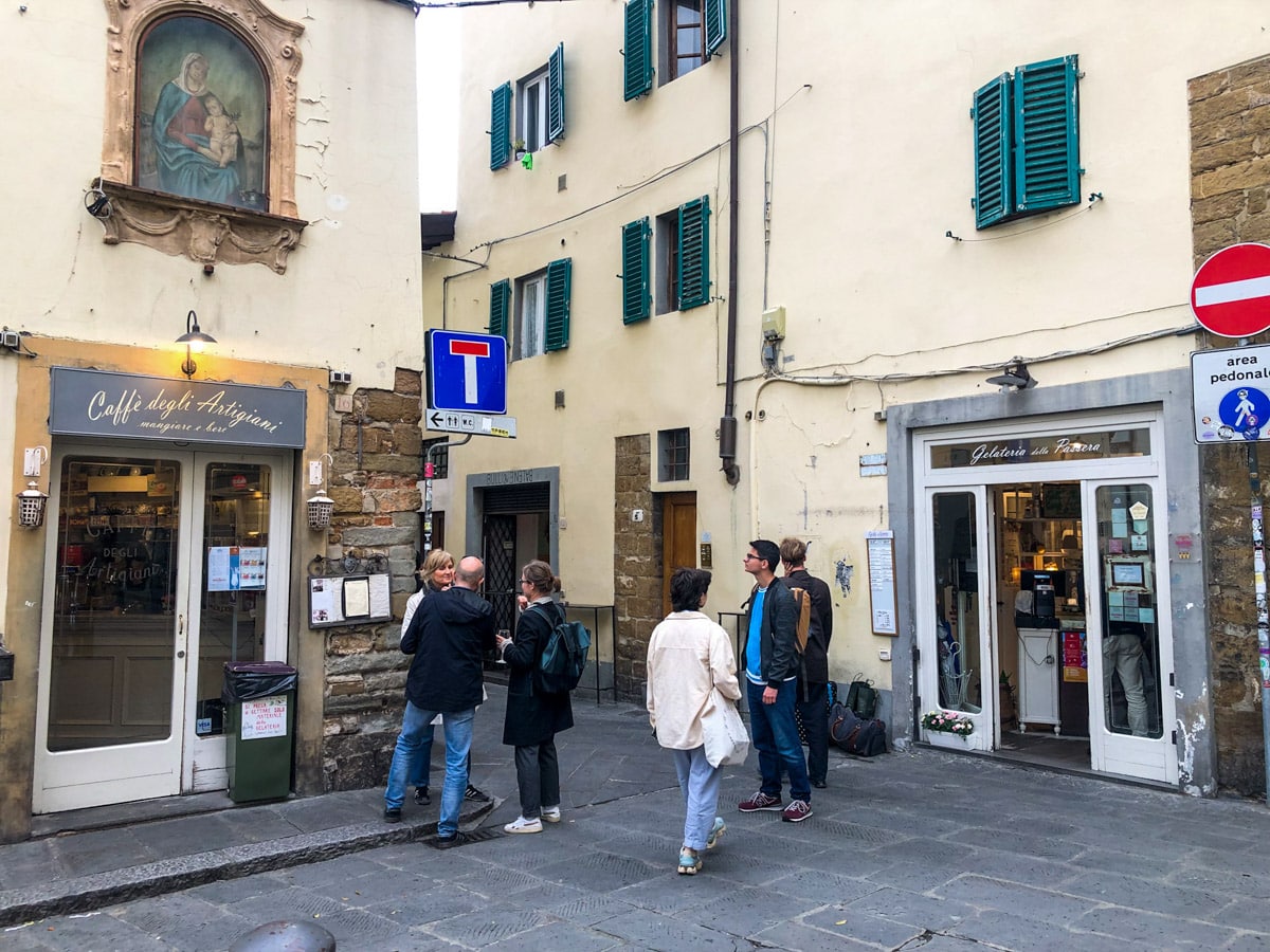 cute little plaza in florence with ice cream shop