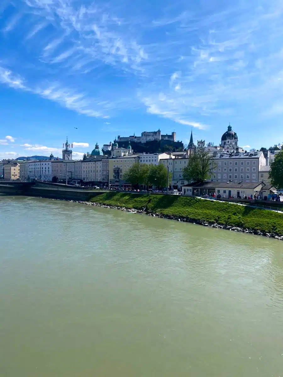 view of old town salzburg and hohensalzburg fortress over the salzach river