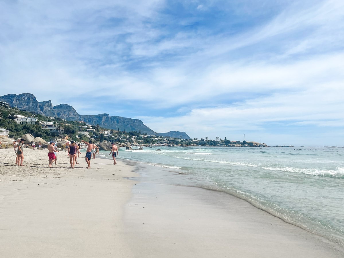 stunning picture of clifton beaches with some people walking on the sand