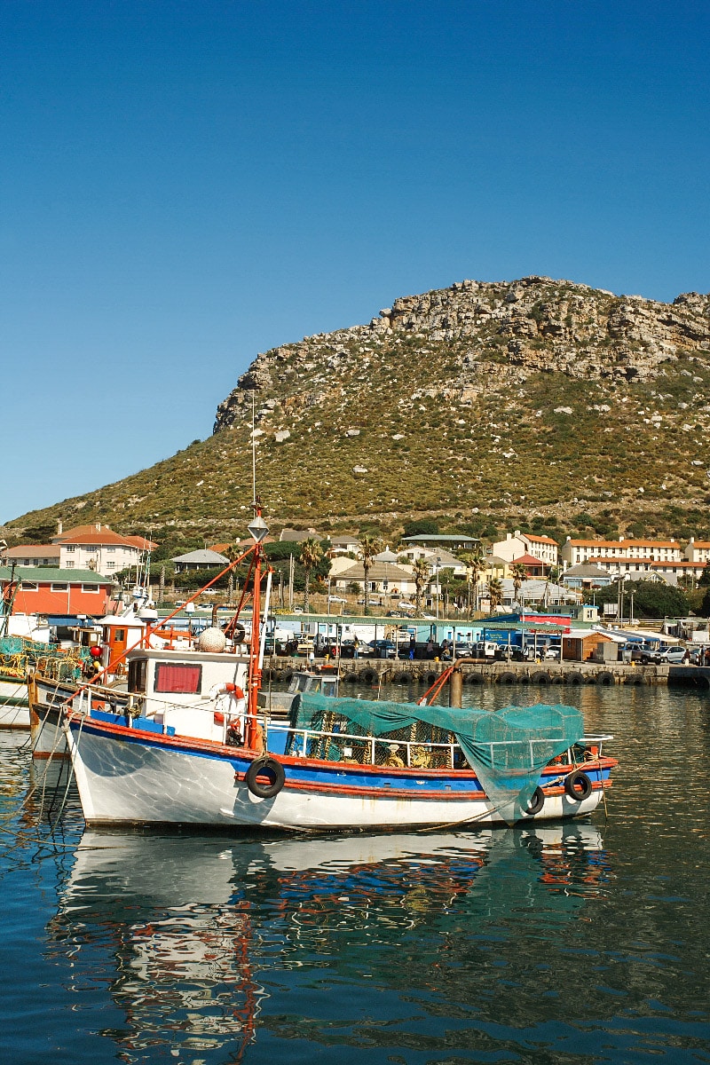 kalk bay in cape town with a fisherman's boat