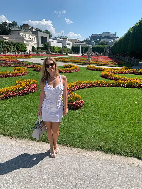 the author in the mirabell gardens in salzburg on a day trip 