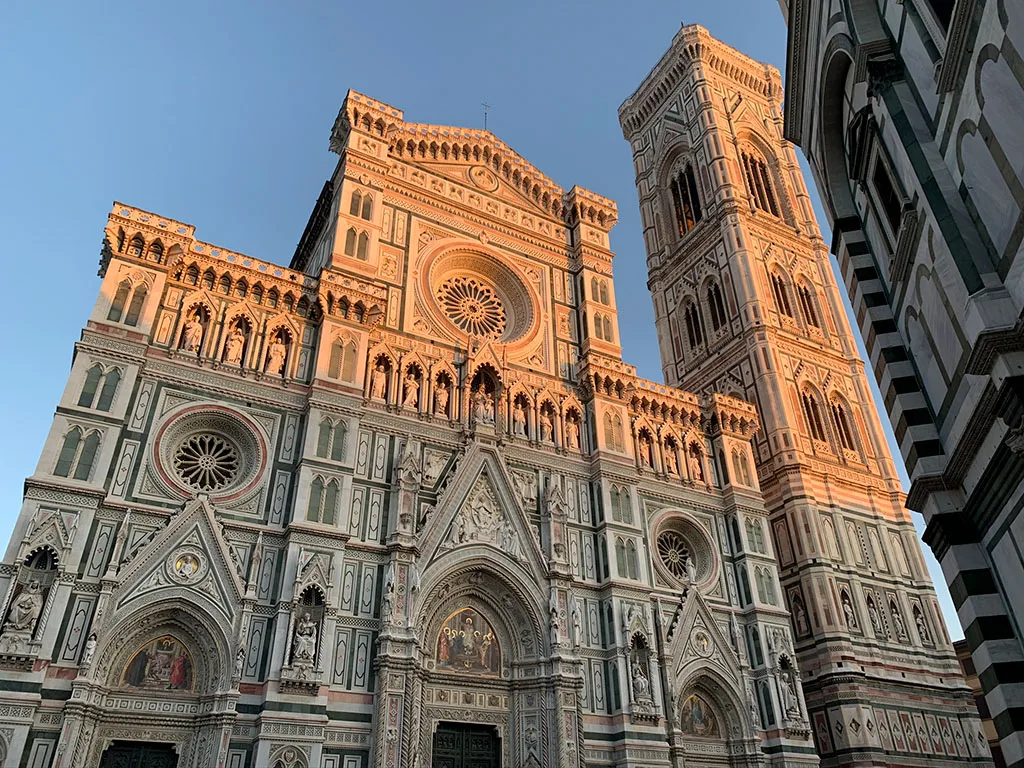 beautiful duomo of florence later in the evening at golden hour with beautiful orange haze