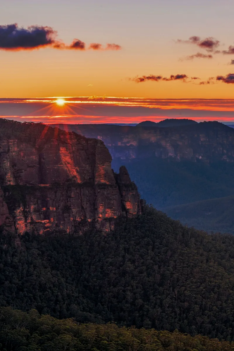 amazing sunset over the three sisters lookout point. 