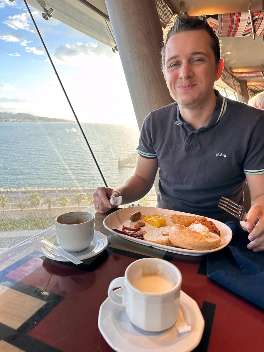 the author's husband eating breakfast at the calumet buffet on the msc divina