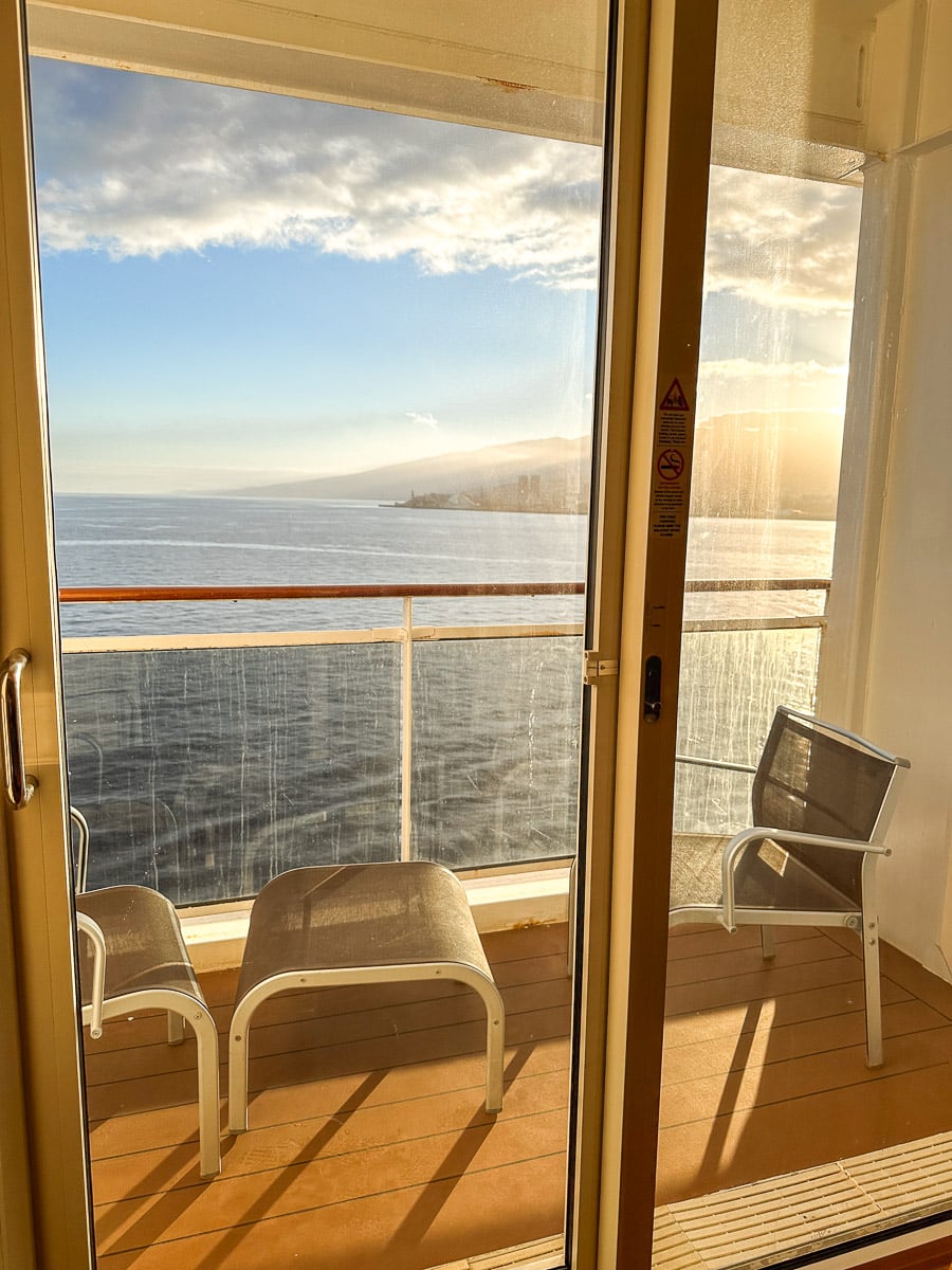 balcony cabin on the msc divina with a view over the french coast in the background