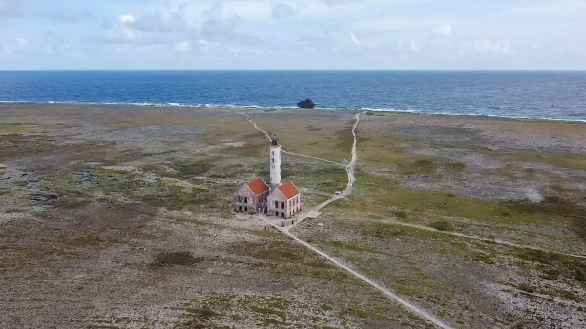 stunning aerial shot of the lighthouse on klein curacao island