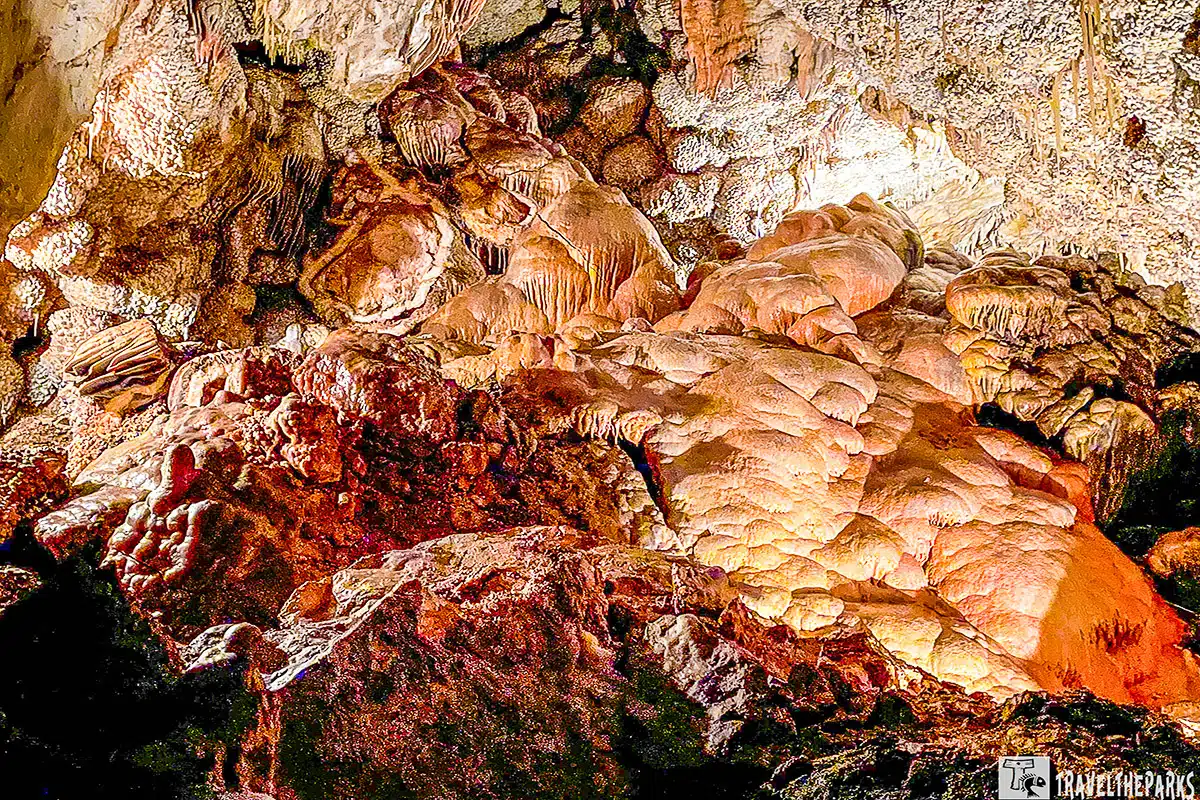 stunning jewel cave monument in orange with stones and other carvings