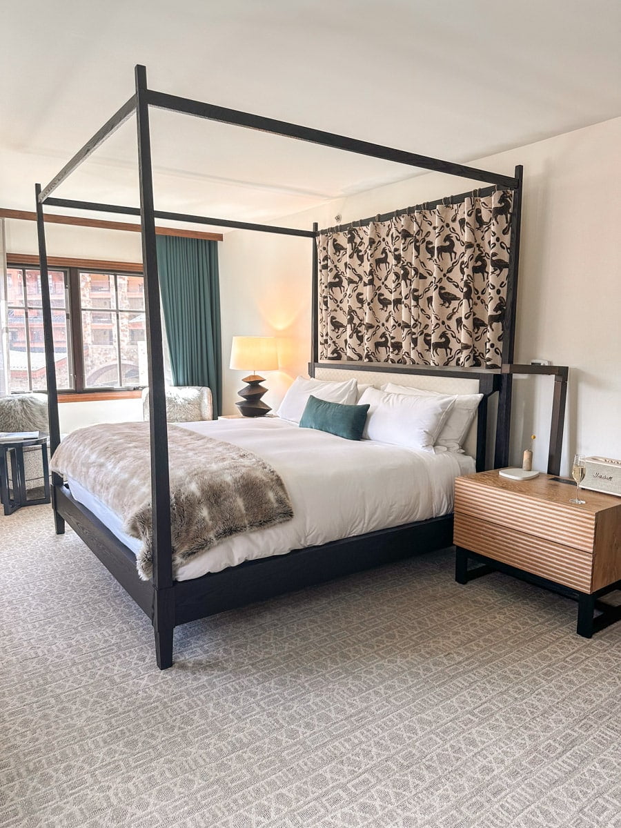 a fantastic cozy bed in a luxurious hotel room in Telluride