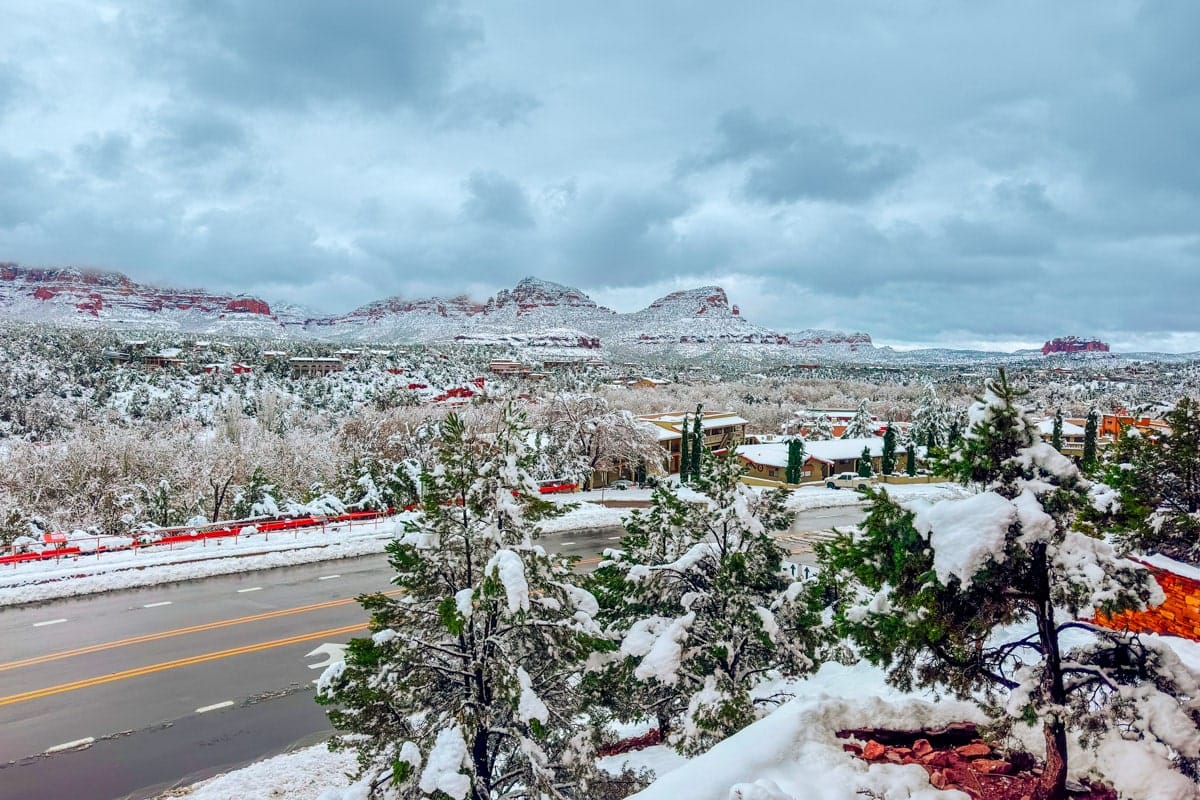 beautiful landscape in sedona covered in snow on a cloudy day