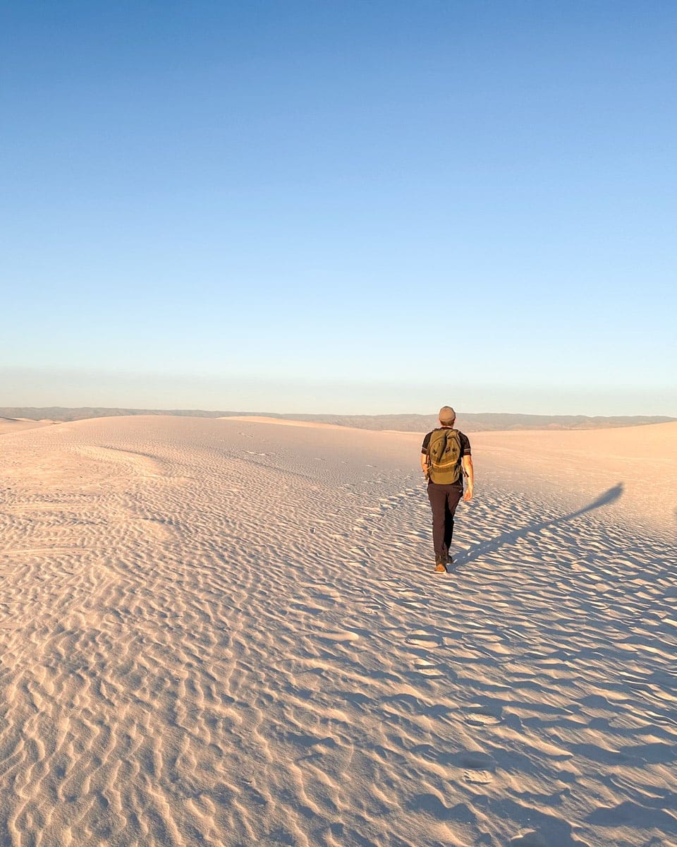 the author hiking along the white sands national park in new mexico