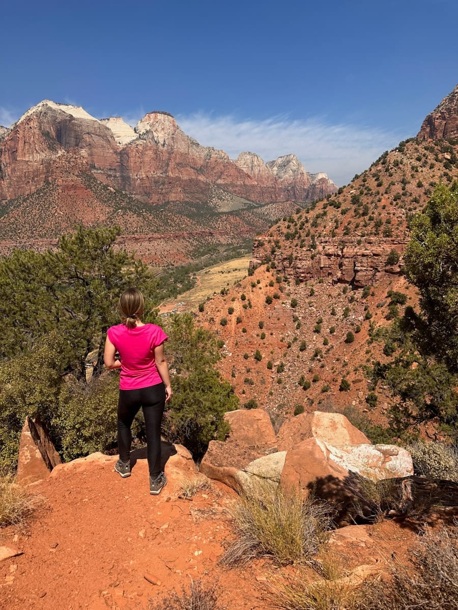 the author's wife posing in the zion national park on the watchman's trail