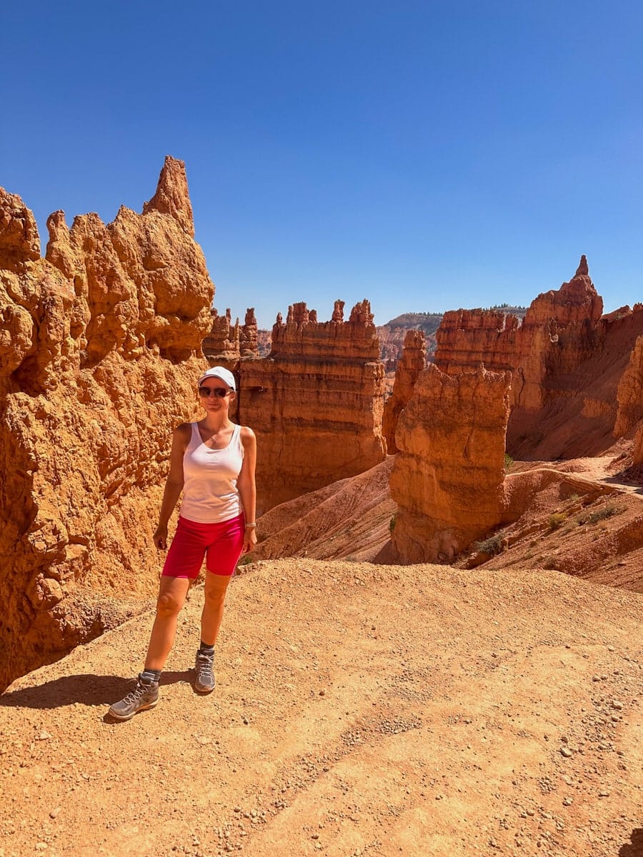 the author's wife posing on the queen's garden trail in bryce canyon