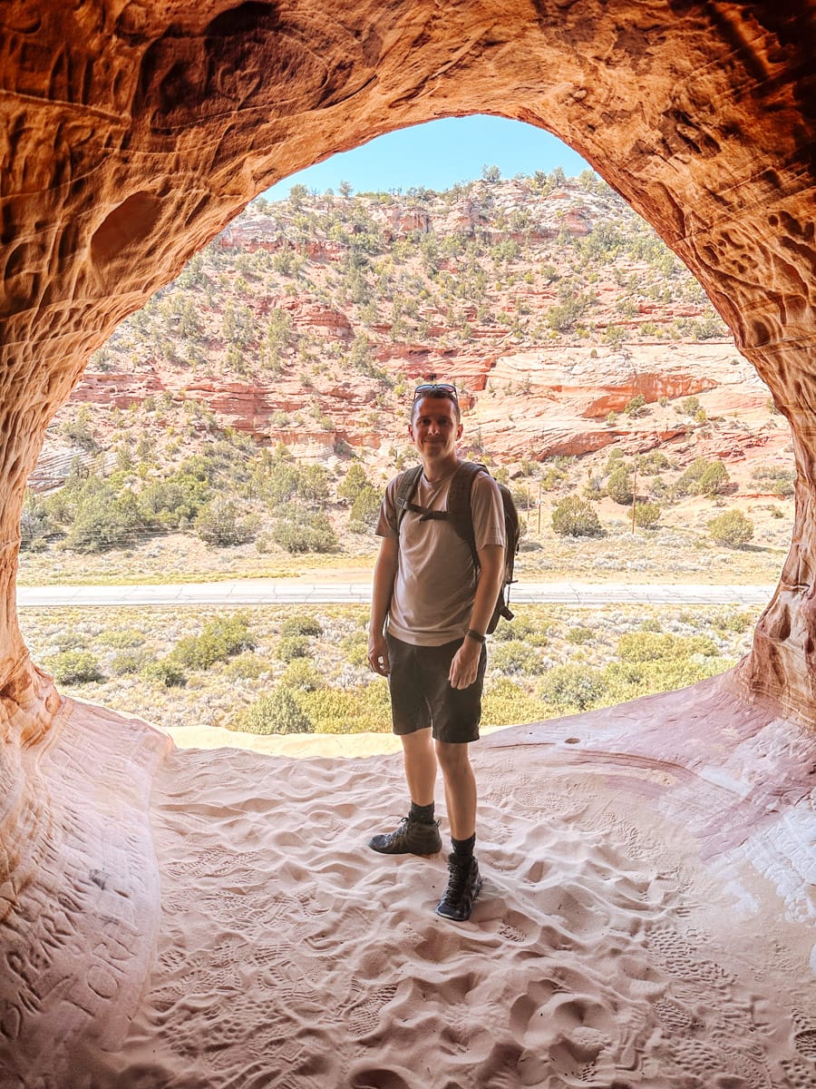 the author smiling inside the kanab sand saves in utah